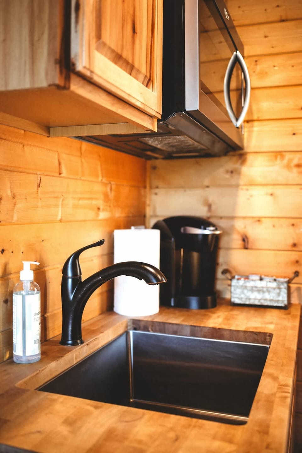 Full size sink in kitchenette along with basic cooking basics