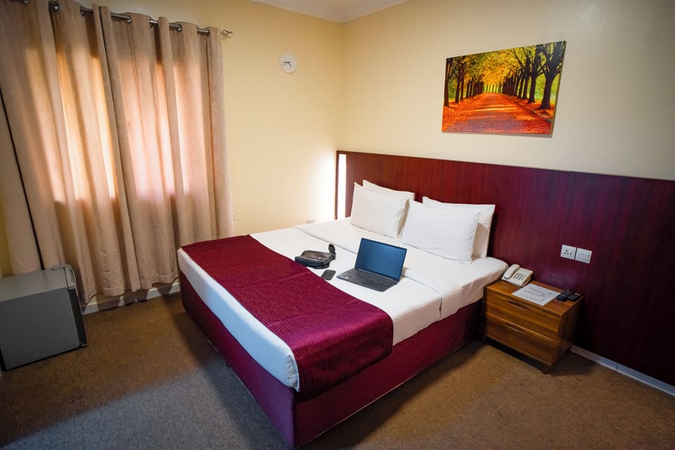 Standard Double Room | Blackout drapes, soundproofing, iron/ironing board, bed sheets