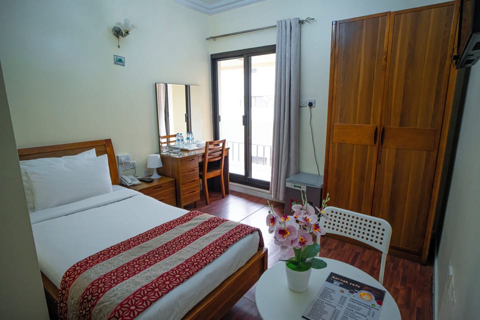 Blackout drapes, soundproofing, iron/ironing board, bed sheets