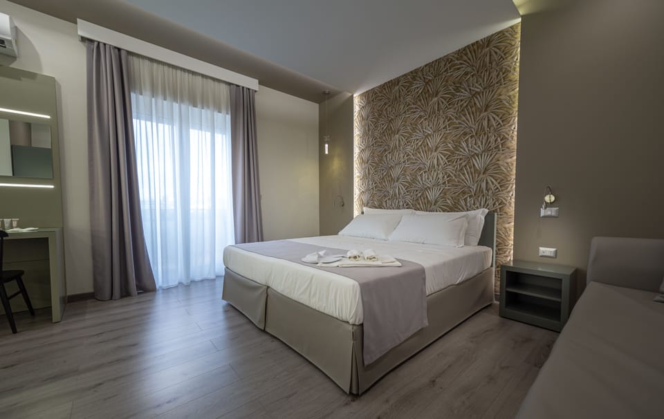 Luxury Quadruple Room (Veranda) | Egyptian cotton sheets, premium bedding, down comforters, pillowtop beds