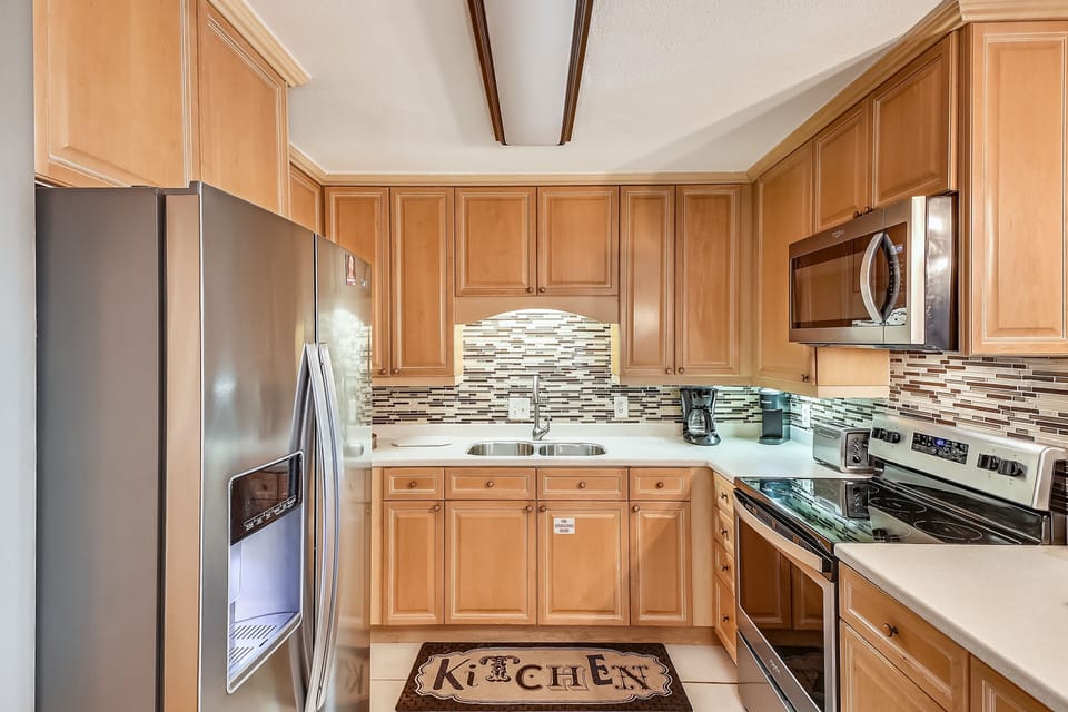 Condo, 2 Bedrooms | Private kitchen | Fridge, microwave, oven, dishwasher