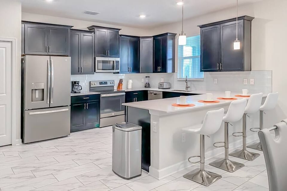 Open kitchen with 4 barstools