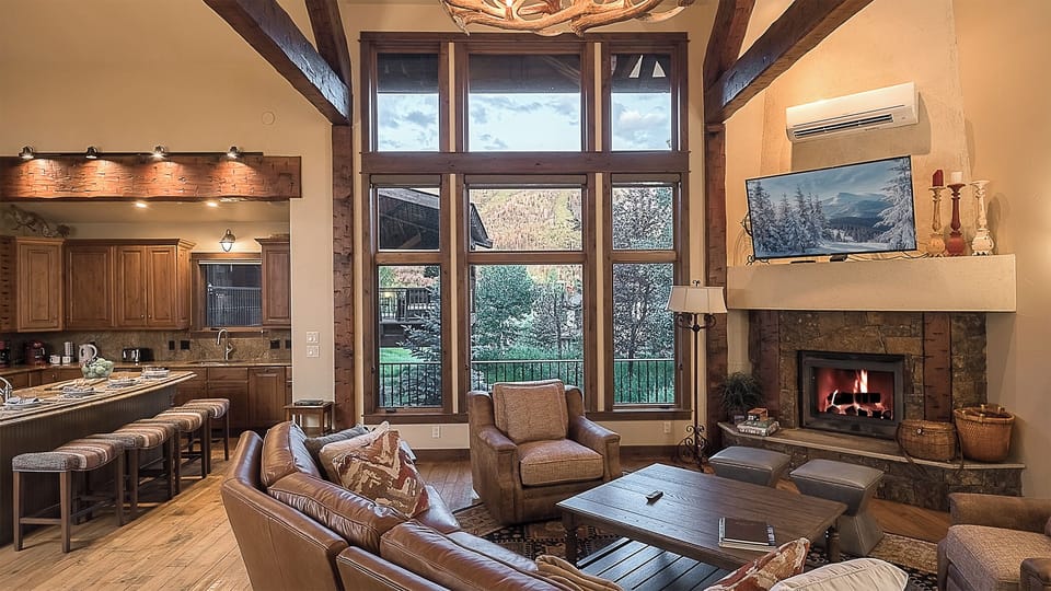 Great Room, Main Level - Seating area with tall windows