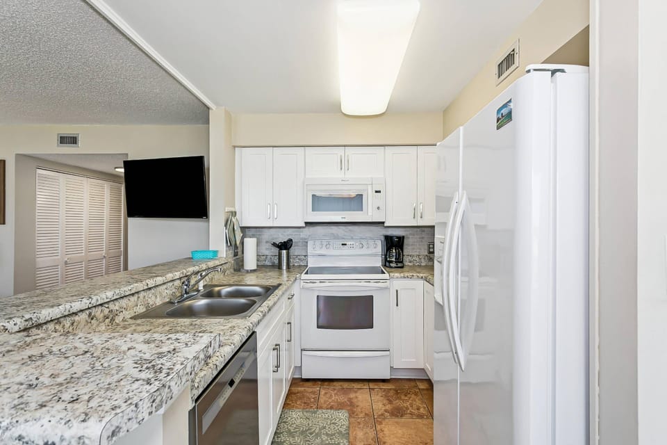The open kitchen allows you to keep an eye on the kids or the big game