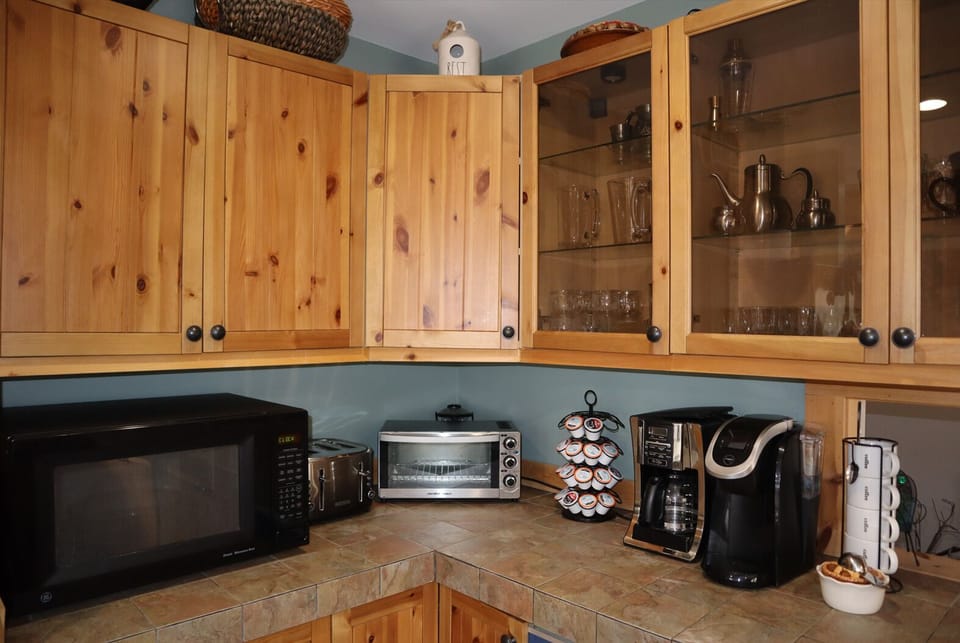 Microwave, toaster oven, drip and Keurig coffee makers provided
