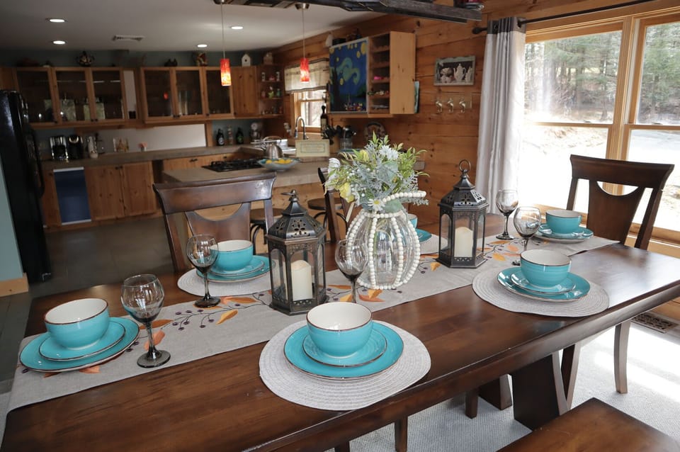 The perfect dinner setting overlooking the forest outside