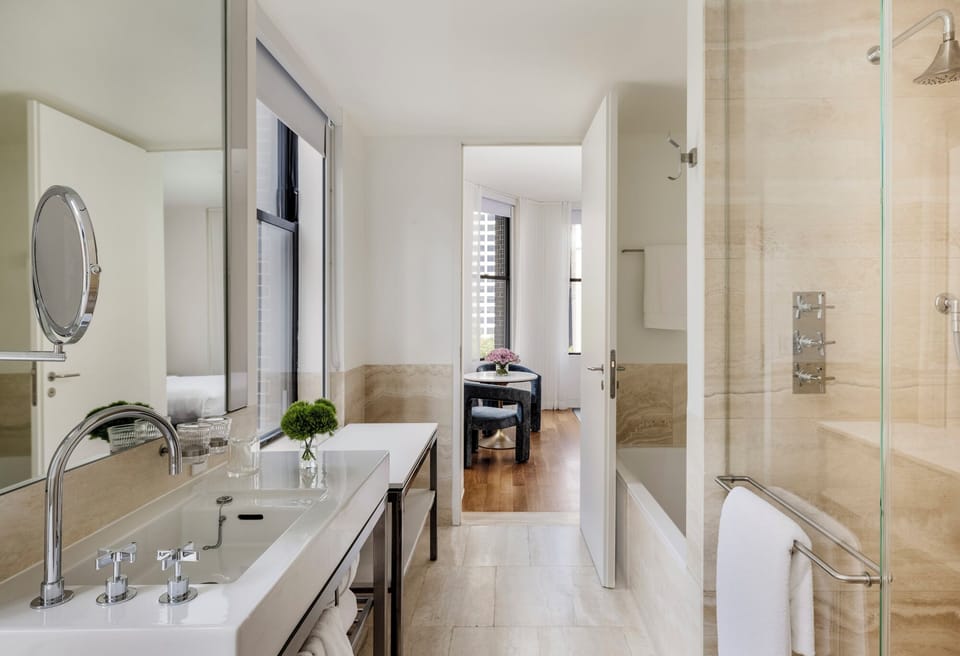 Designer toiletries, hair dryer, bathrobes, slippers