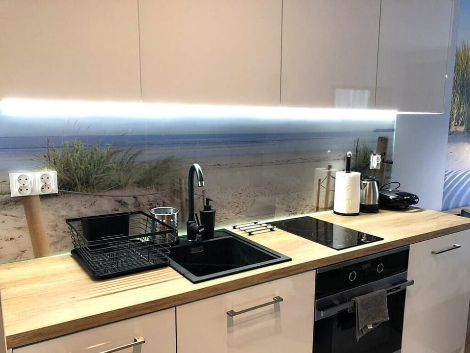 Apartment | Private kitchen | Fridge, stovetop, dishwasher, electric kettle
