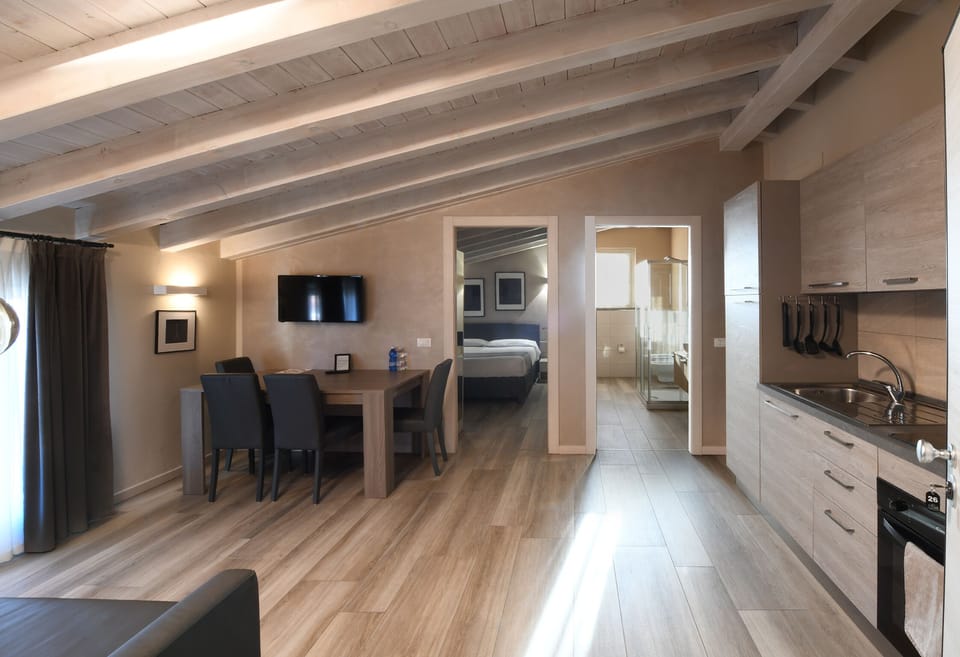 Apartment (4 Adults Apt 26) | Living area | 32-inch flat-screen TV with cable channels, TV