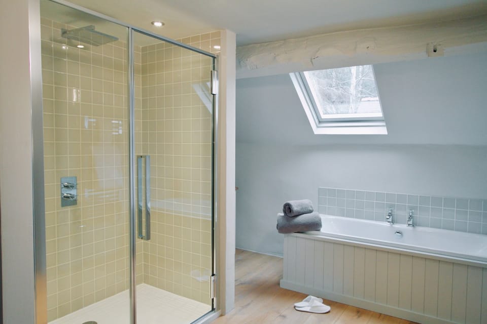 The Trefaldwyn (Super King) | Bathroom | Separate tub and shower, rainfall showerhead, designer toiletries