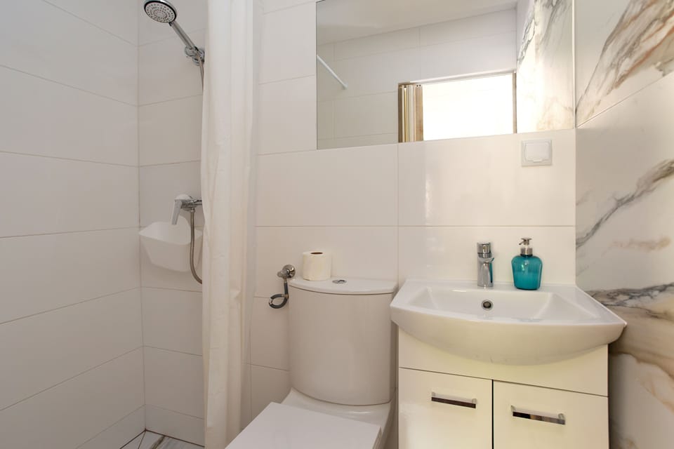bathroom with wc and shower