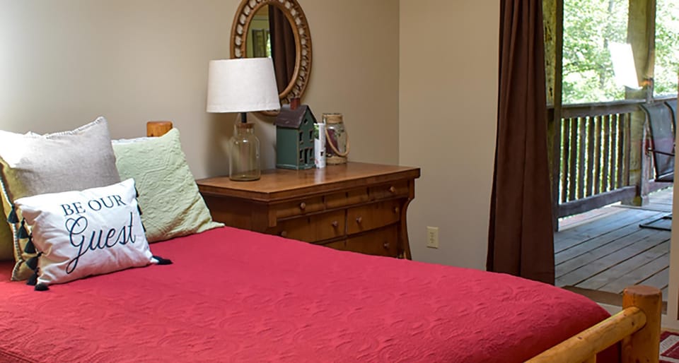 First floor bedroom with deck access
