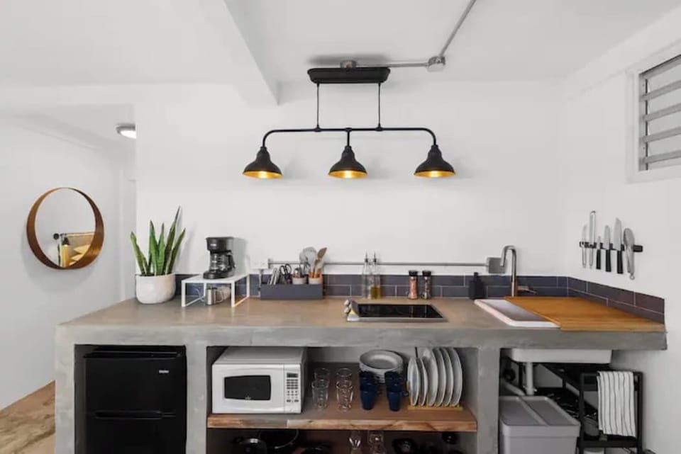 The kitchen has a comprehensive housewares package for full course meal prep