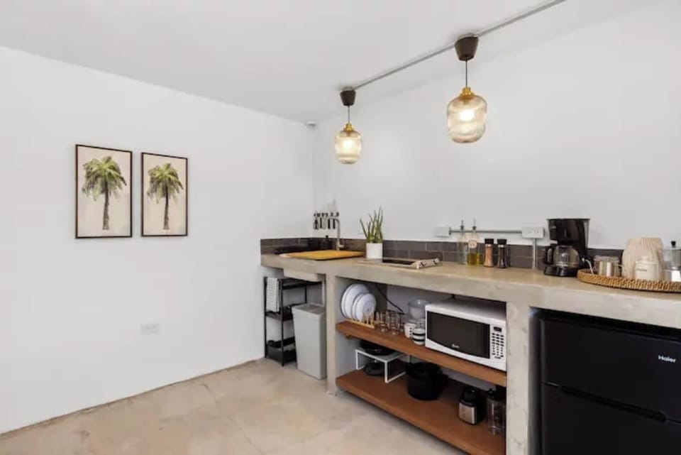 The chef’s kitchen comes complete with prep & cookware for full-course meals 