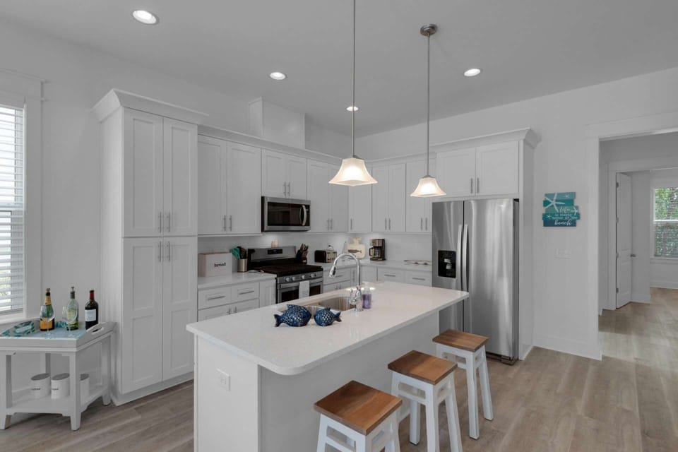The kitchen offers beautiful granite counter-tops with all new stainless appliances