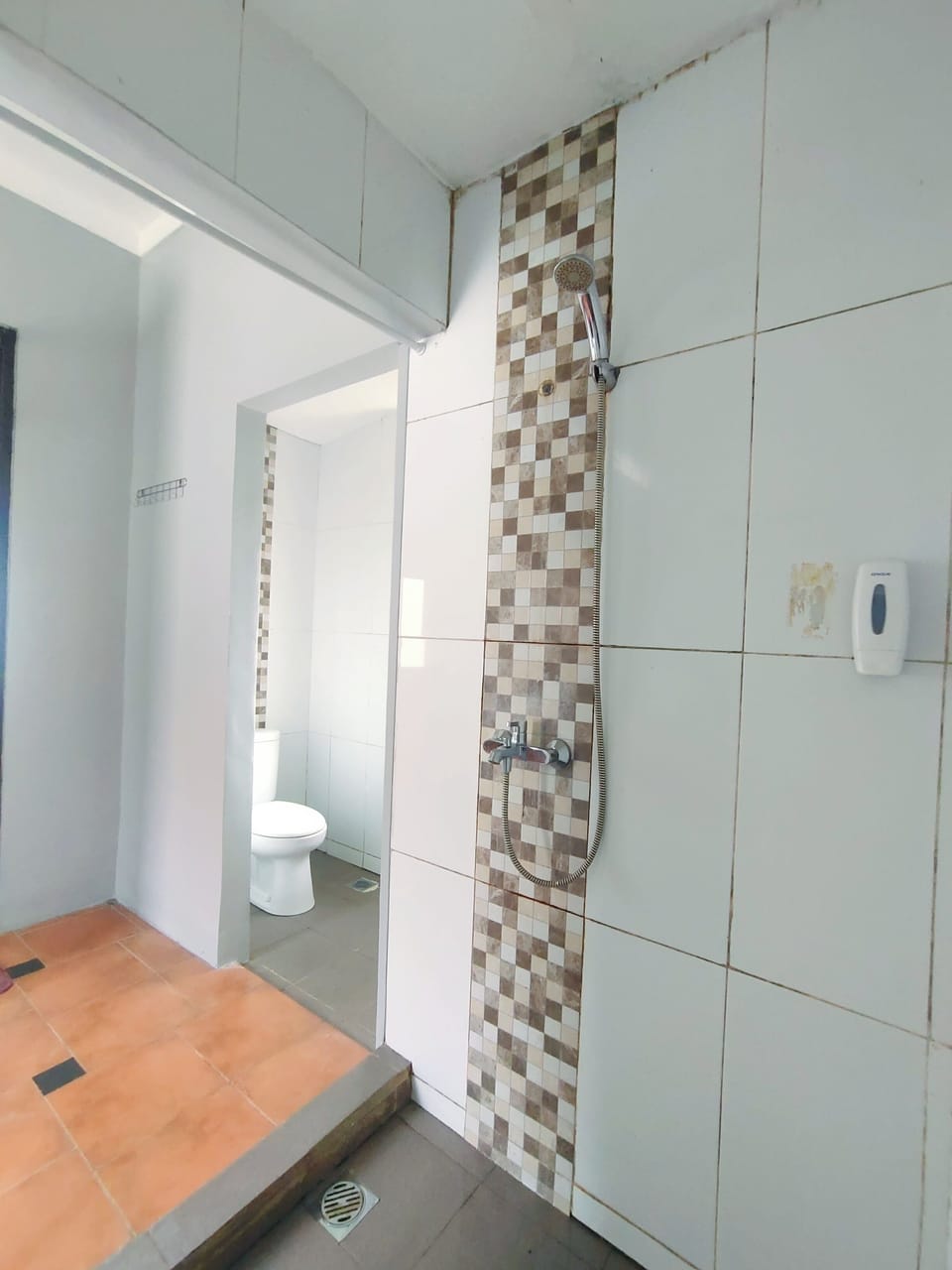 Shower, slippers, towels, soap