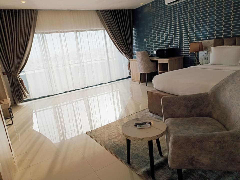 Presidential Villa | Living area | 32-inch TV with satellite channels