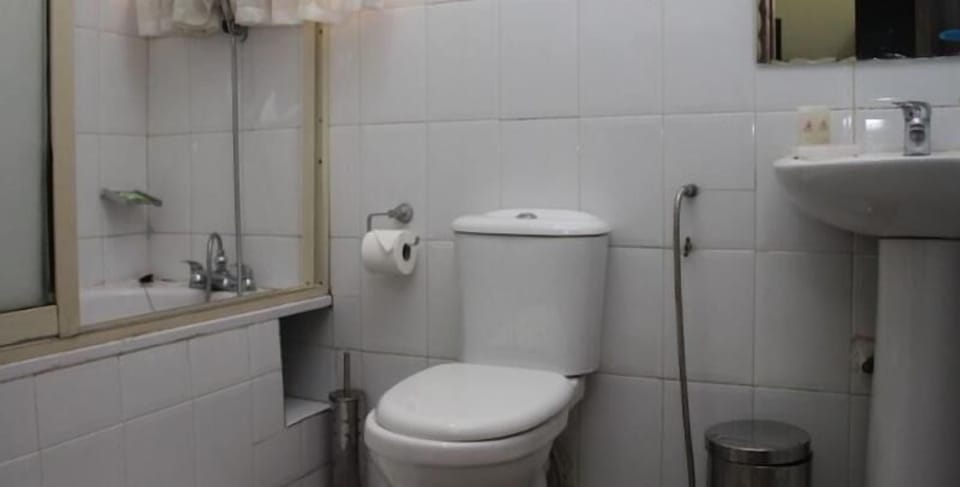 Shower, rainfall showerhead, towels, soap