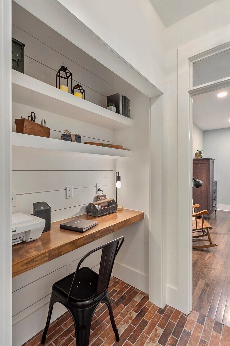 Built-in workstation is complete with printer, Wi-Fi, and a desk for guest to use.