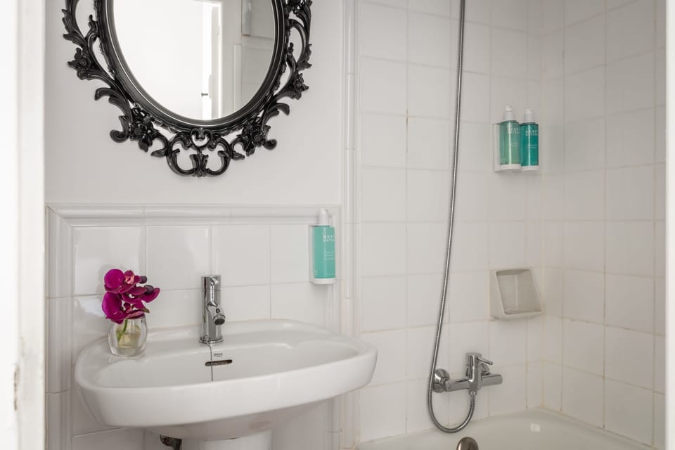 Combined shower/tub, eco-friendly toiletries, hair dryer, towels