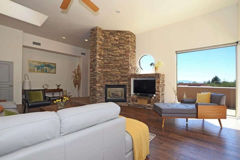 A stunning stone clad fireplace and Smart TV