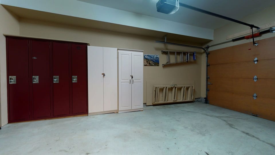 Secure single-car garage with plenty of room for bikes or gear.
