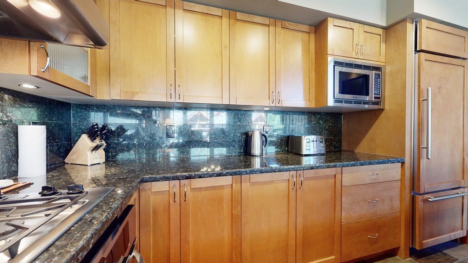 Sleek cabinetry and modern lighting complement the contemporary alpine style.
