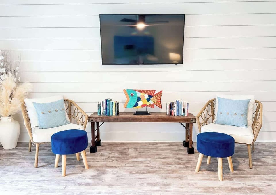 Living Area with Balcony and Pool Access