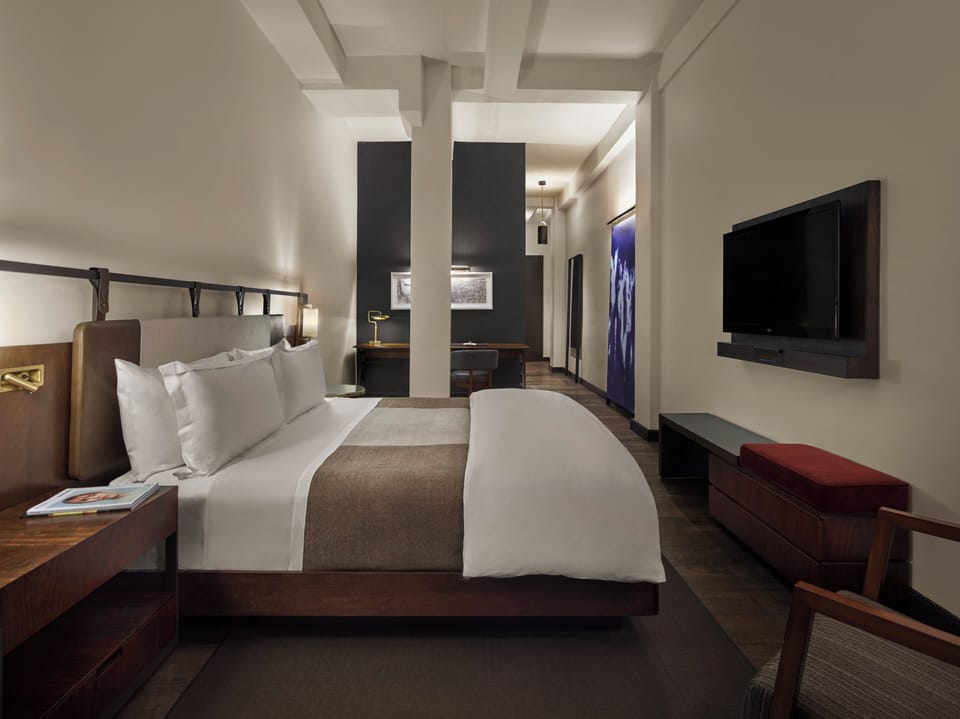 Frette Italian sheets, premium bedding, down comforters, minibar