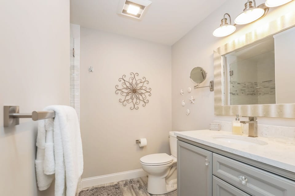 En-suite full bathroom with glass shower - 405 Old Wharf Road-Dennisport Cape Cod- New England Vacation Rentals