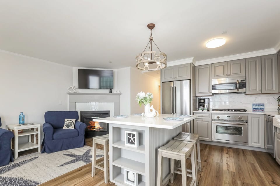 Open concept Kitchen/Living room, center island with seating for 4 - 405 Old Wharf Road-Dennisport Cape Cod- New England Vacation