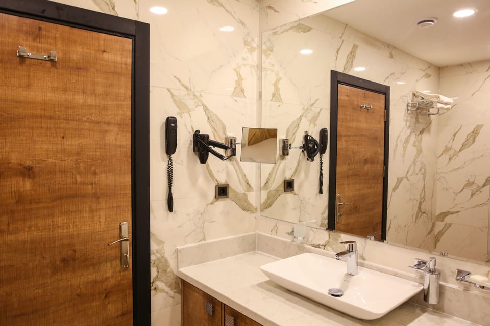 Standard Double Room, Non Smoking, City View | Bathroom | Shower, hair dryer, bathrobes, slippers