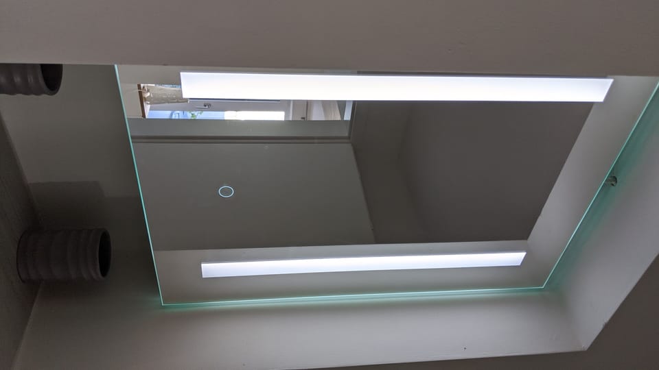 Lighted vanity with hidden storage