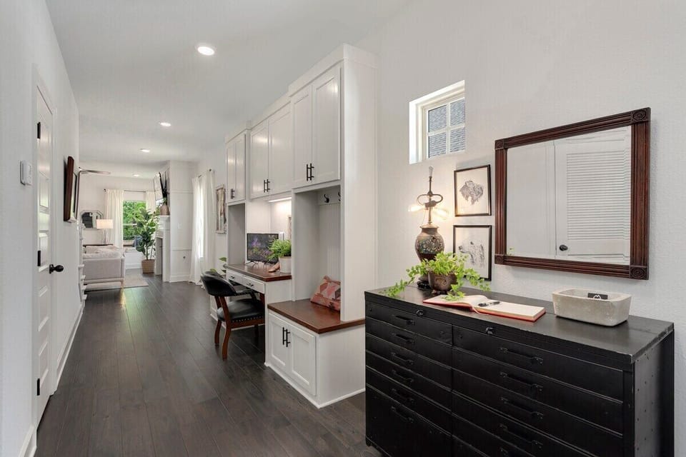 The entry way of our home is sweet as they come. Featuring antique details and a guest book we can't wait to have you fill!