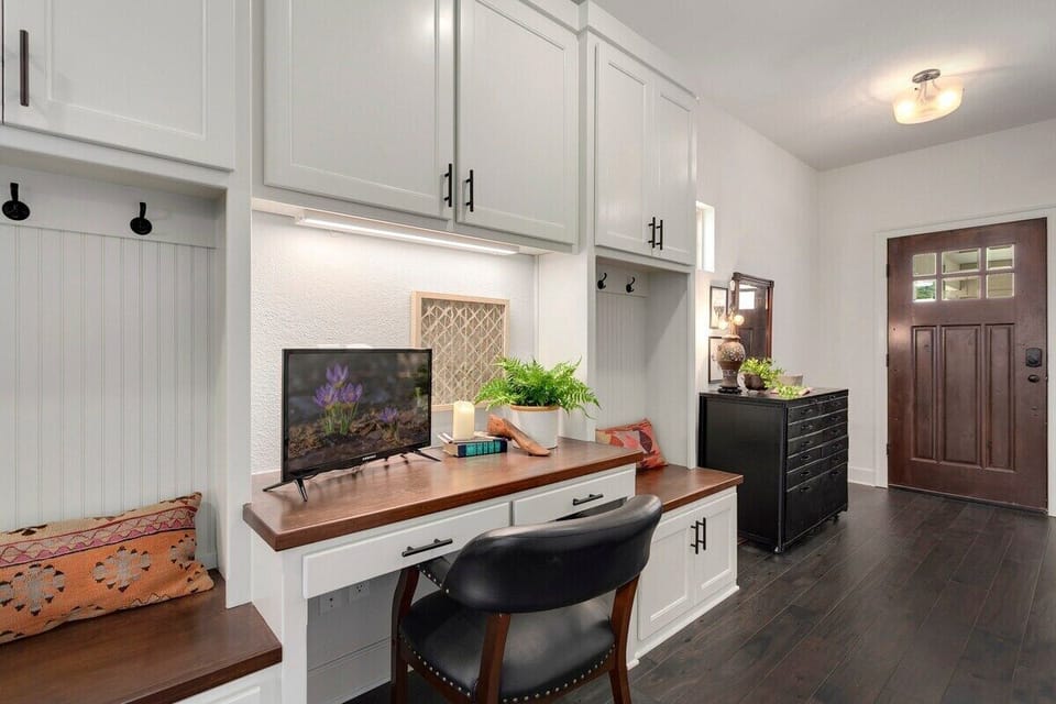 A home desk space with computer monitor makes working away from home super accessible.