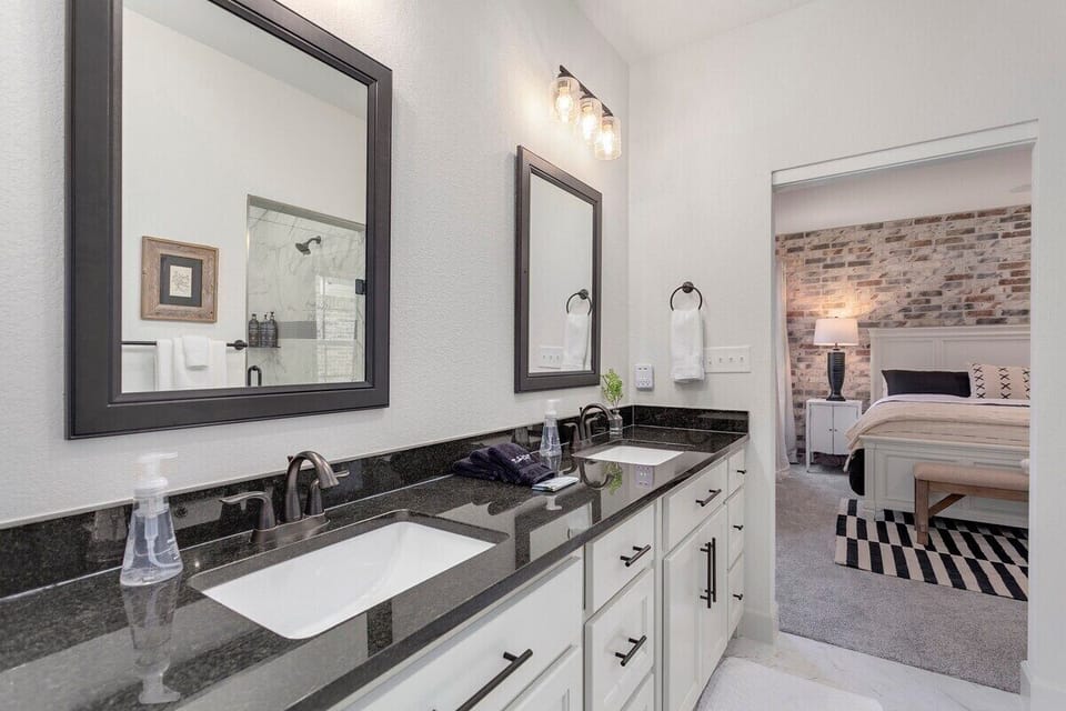 The master bedroom's en suite bath is as luxurious as they come! Jack & Jill sinks, walk in shower, and large closet.