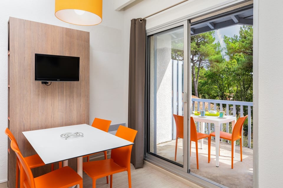 Enjoy a meal at the dining table.
