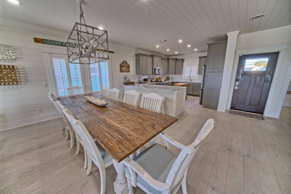 Gather around this artisanal dining table, perfectly suited for memorable meals and cherished conversations in your private retreat.