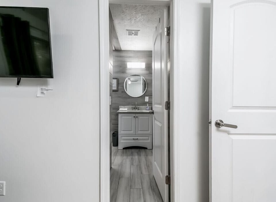Leading into master bathroom in the suite 