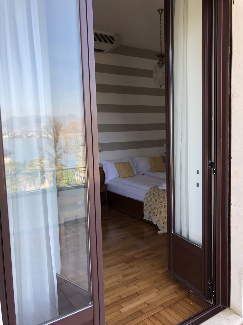 Deluxe Room, Terrace, Lake View | Down comforters, memory foam beds, minibar, in-room safe