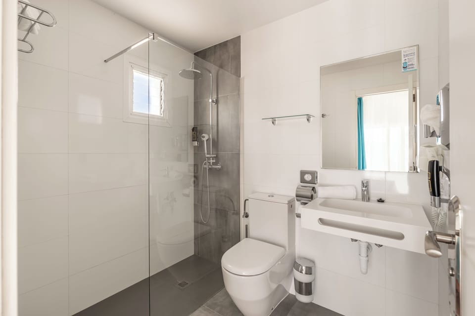 Family Room, Balcony, Sea View | Bathroom | Shower, free toiletries, hair dryer, towels