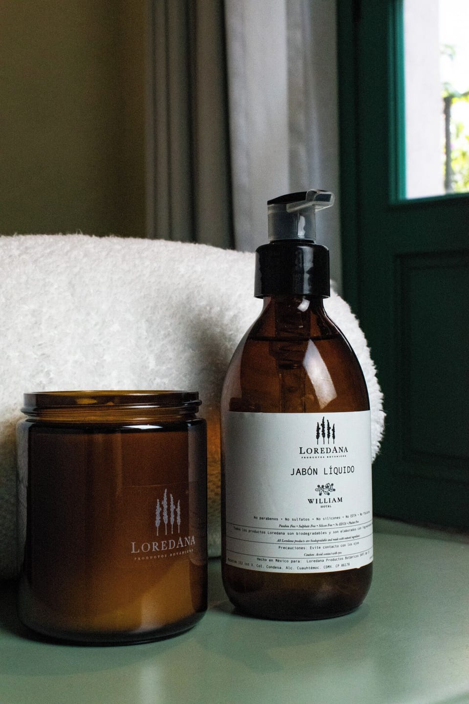 Shower, rainfall showerhead, designer toiletries, hair dryer