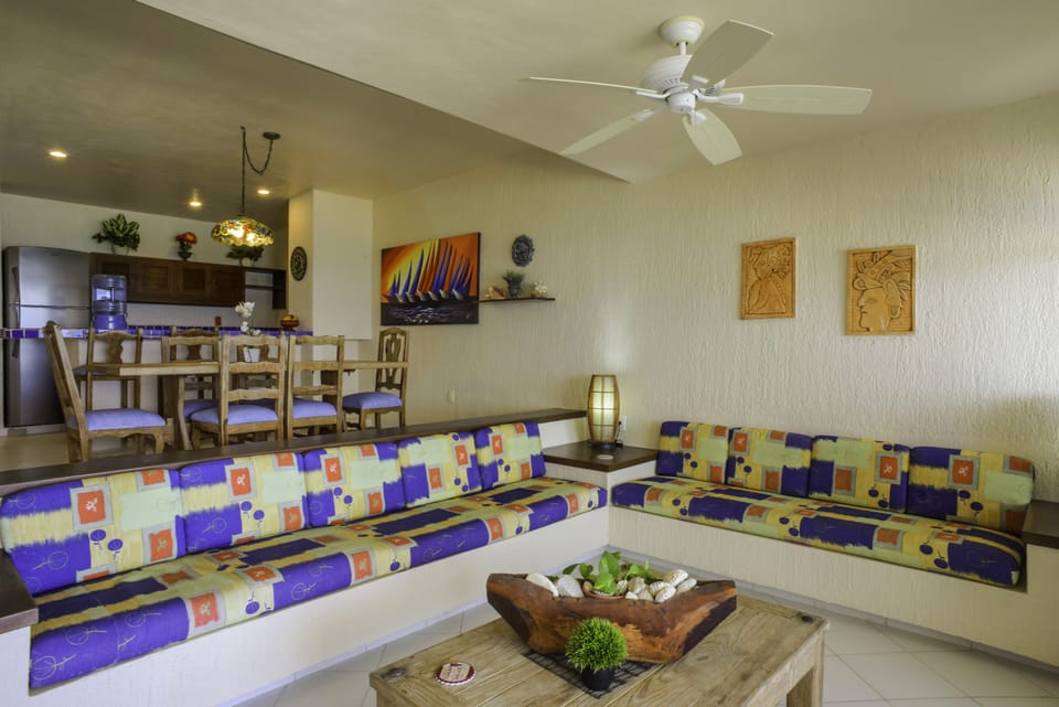 Condo, 1 Bedroom, Ocean View, Beachfront | Living area | Flat-screen TV