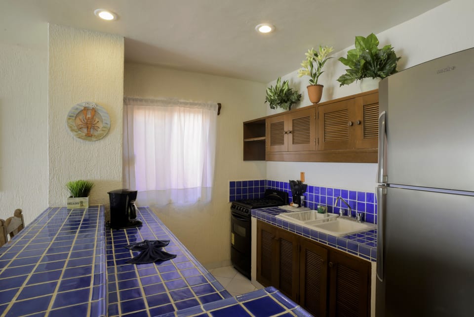 Condo, 2 Bedrooms, Ocean View, Beachfront | Private kitchen | Coffee/tea maker