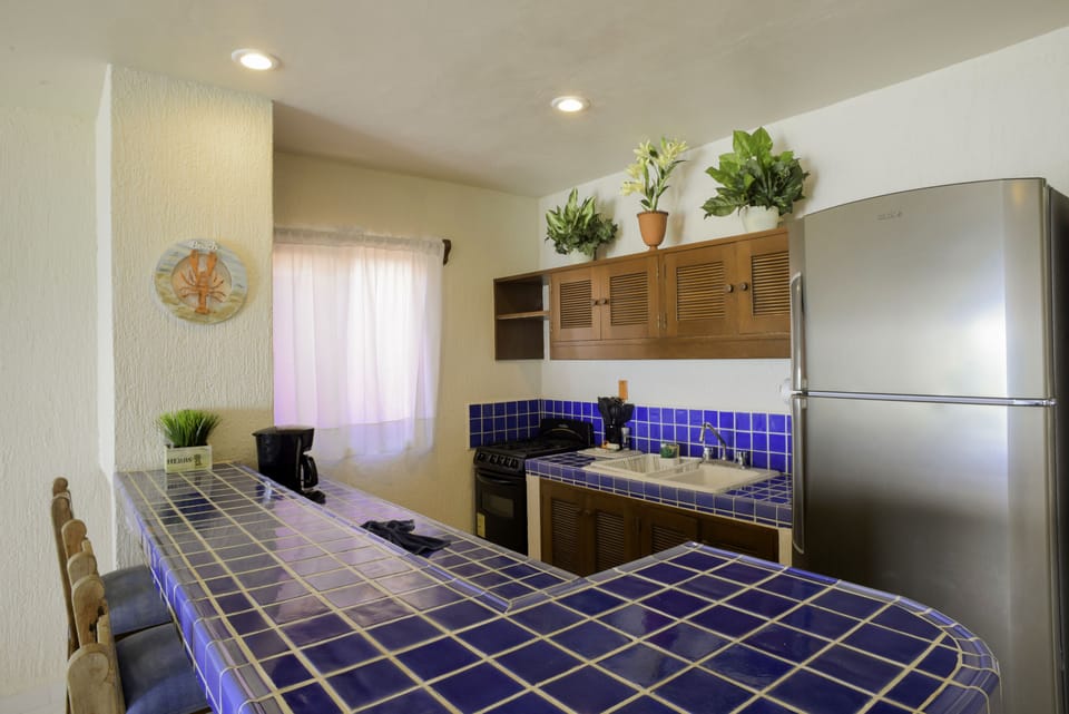 Condo, 3 Bedrooms, Ocean View, Beachfront | Private kitchen | Coffee/tea maker