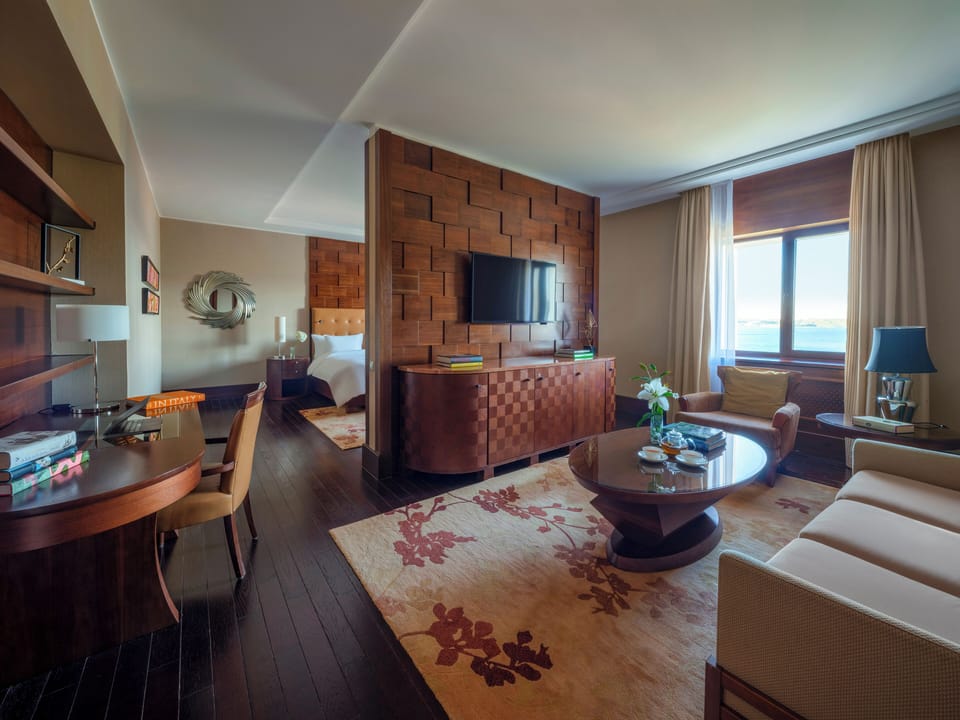 Junior Suite, 1 King Bed, Lake View | Living area | 32-inch LCD TV with satellite channels, TV