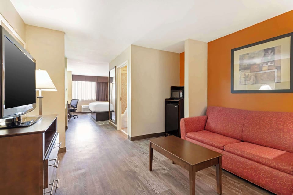 Suite, 1 King Bed, Non Smoking, Refrigerator & Microwave | Pillowtop beds, desk, laptop workspace, blackout drapes