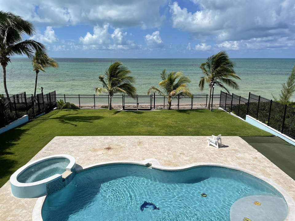 Balcony views on the Backyard, Pool and Beach