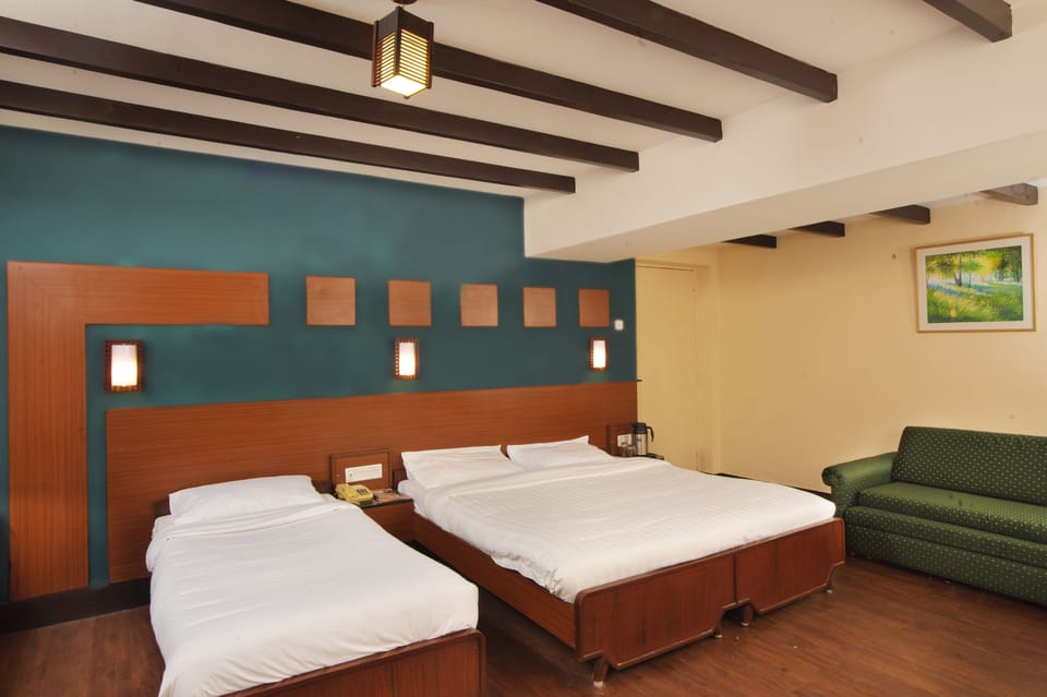 Family Triple Room, 2 Double Beds | In-room safe, rollaway beds, free WiFi