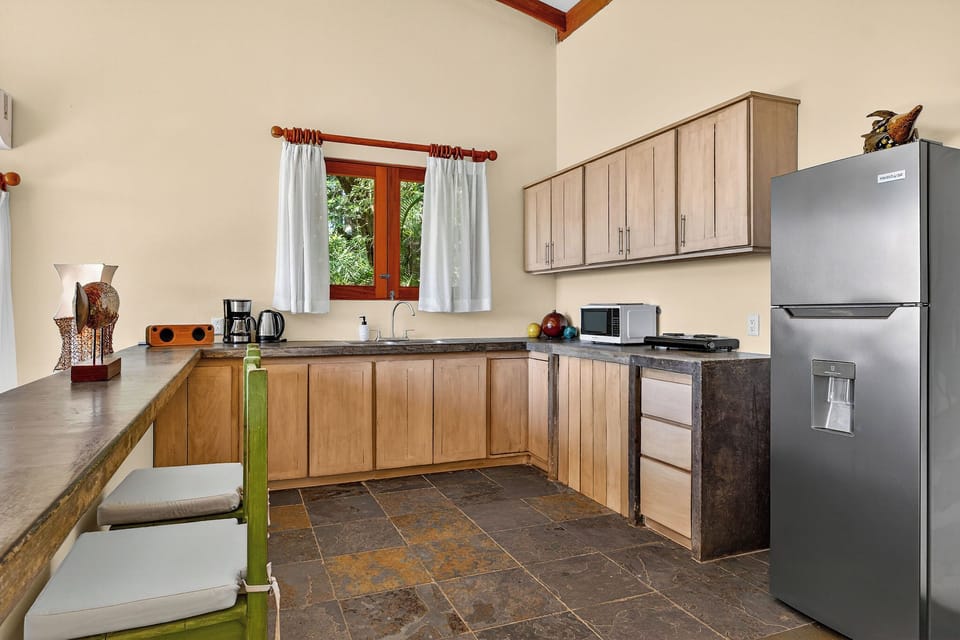 Villa Suite | Private kitchen | Mini-fridge, microwave, stovetop, coffee/tea maker
